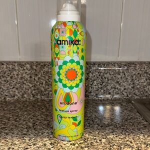 Amika Undone Texture Spray - Bright Green and Pink